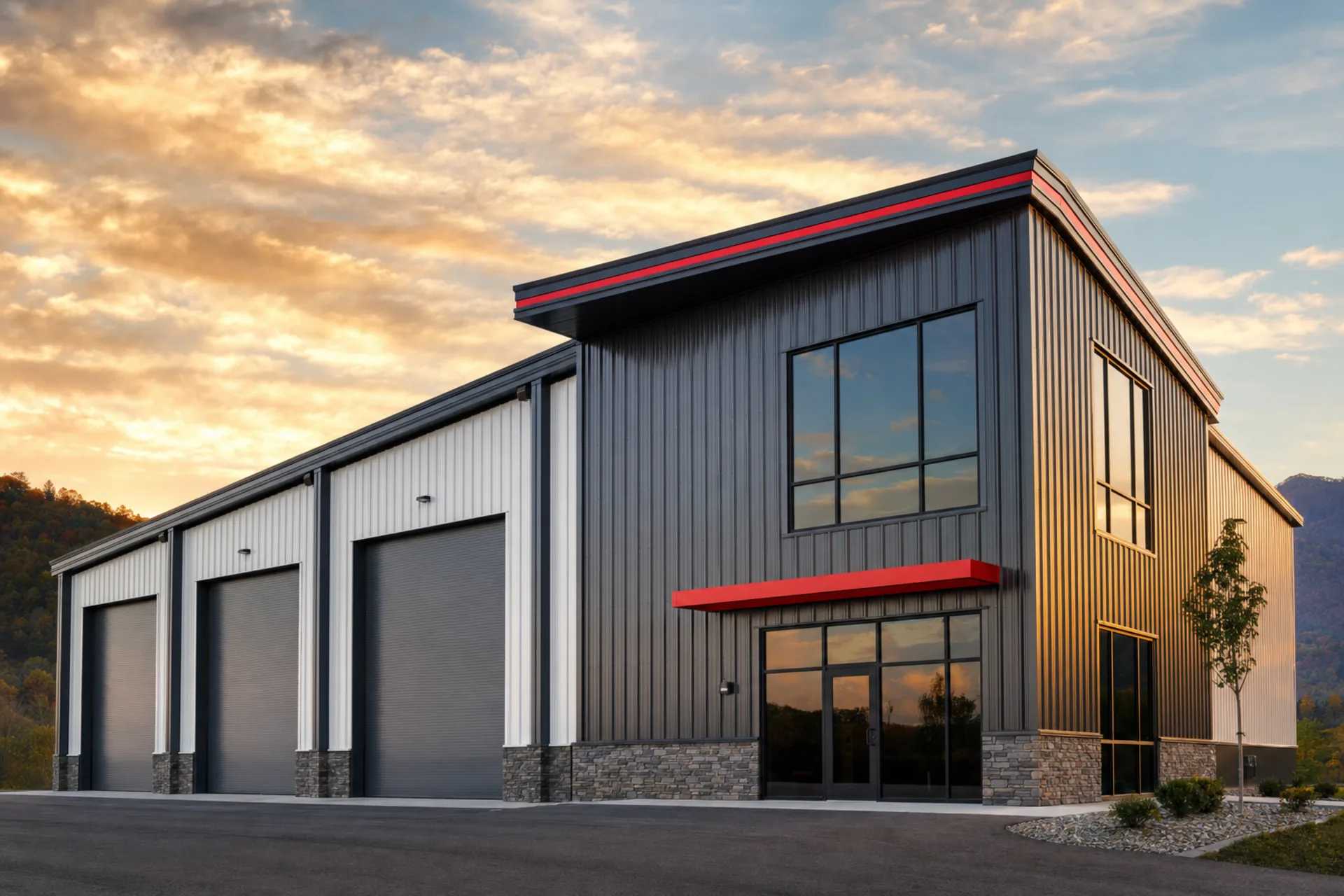 Charcoal and white standing-seam metal commercial building with red accent trim